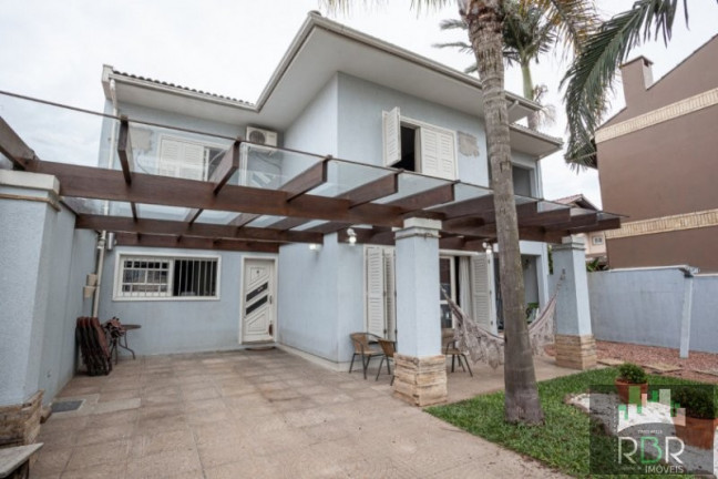 Imagem Casa com 4 Quartos à Venda, 223 m² em Torres Imagem Casa com 4 Quartos à Venda, 223 m² em Torres