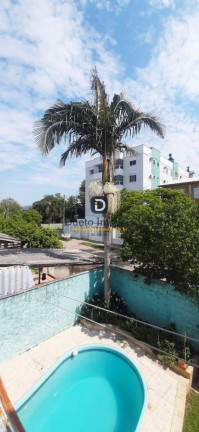 Imagem Sobrado com 6 Quartos à Venda, 294 m² em Camobi - Santa Maria