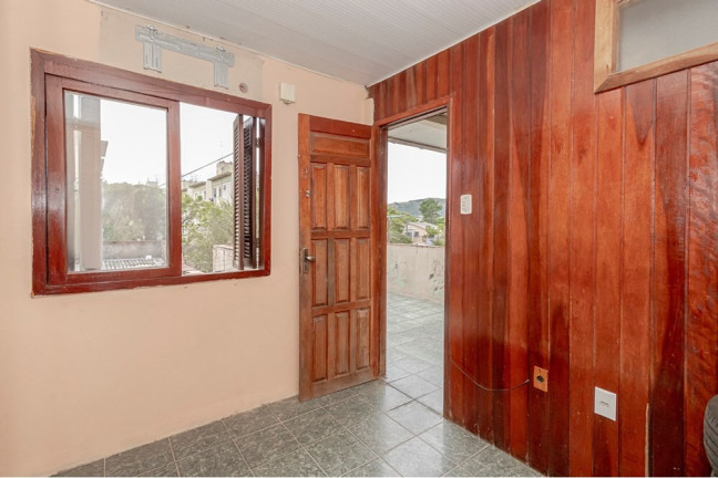 Imagem Casa com 4 Quartos à Venda, 170 m² em Vila Nova - Porto Alegre Imagem Casa com 4 Quartos à Venda, 170 m² em Vila Nova - Porto Alegre