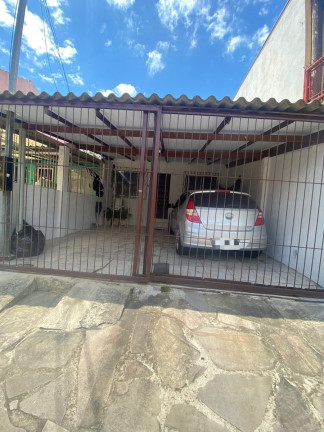 Imagem Casa com 2 Quartos à Venda, em Costa E Silva - Porto Alegre Imagem Casa com 2 Quartos à Venda, em Costa E Silva - Porto Alegre