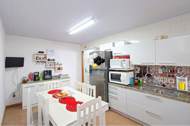 Imagem Casa com 2 Quartos à Venda, 101 m² em Vila Nova - Porto Alegre Imagem Casa com 2 Quartos à Venda, 101 m² em Vila Nova - Porto Alegre