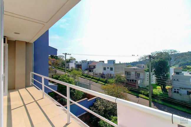 Imagem Casa de Condomínio com 3 Quartos à Venda, 205 m² em Vila Nova - Porto Alegre