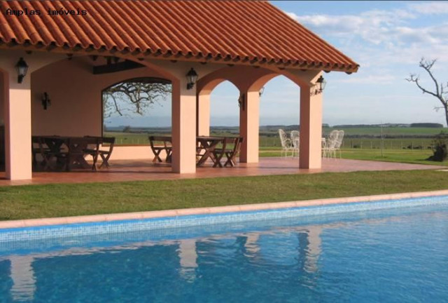 Imagem Imóvel com 4 Quartos à Venda, 1.000 m²