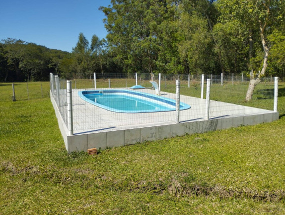 Imagem Chácara com 4 Quartos à Venda, 10.000 m² em Fiuza - Viamão
