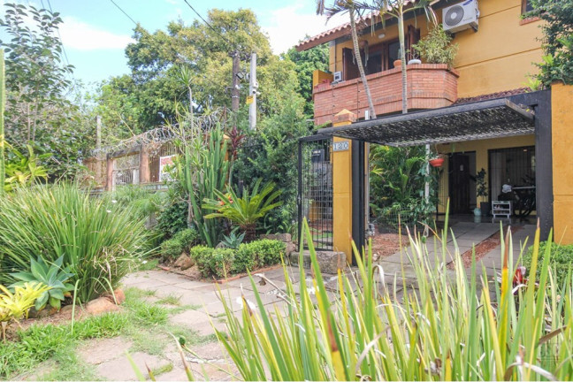 Imagem Casa com 3 Quartos à Venda, 154 m² em Espírito Santo - Porto Alegre Imagem Casa com 3 Quartos à Venda, 154 m² em Espírito Santo - Porto Alegre