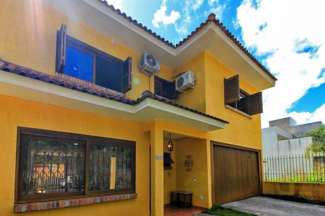 Imagem Casa com 3 Quartos à Venda, 197 m² em Hípica - Porto Alegre Imagem Casa com 3 Quartos à Venda, 197 m² em Hípica - Porto Alegre
