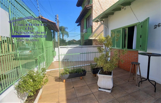 Imagem Casa com 5 Quartos à Venda, 280 m² em Camaquã - Porto Alegre Imagem Casa com 5 Quartos à Venda, 280 m² em Camaquã - Porto Alegre