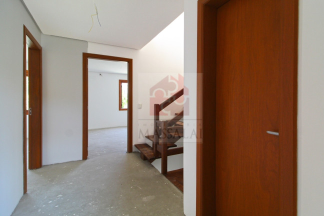 Imagem Casa com 3 Quartos à Venda, 240 m² em Vila Nova - Porto Alegre Imagem Casa com 3 Quartos à Venda, 240 m² em Vila Nova - Porto Alegre