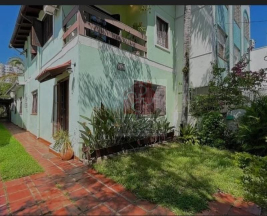 Imagem Casa com 3 Quartos à Venda, 178 m² em Santana - Porto Alegre Imagem Casa com 3 Quartos à Venda, 178 m² em Santana - Porto Alegre