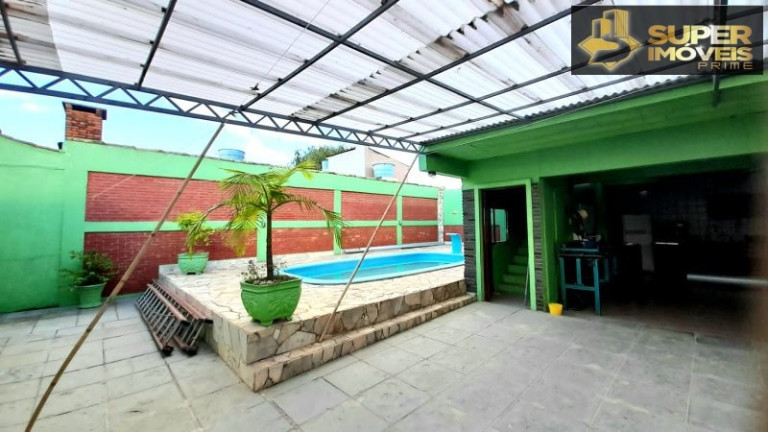 Imagem Casa com 4 Quartos à Venda, 432 m² em Laranjal - Pelotas