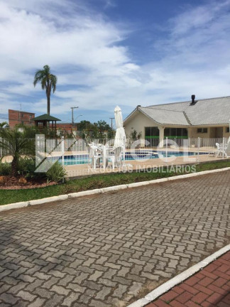 Imagem Casa com 3 Quartos à Venda, 135 m² em Olaria - Canoas Imagem Casa com 3 Quartos à Venda, 135 m² em Olaria - Canoas