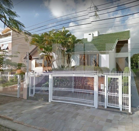 Imagem Casa com 3 Quartos à Venda, 430 m² em Jardim Lindóia - Porto Alegre Imagem Casa com 3 Quartos à Venda, 430 m² em Jardim Lindóia - Porto Alegre