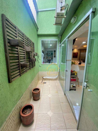 Imagem Casa com 3 Quartos à Venda, 113 m² em Ponta Da Praia - Santos