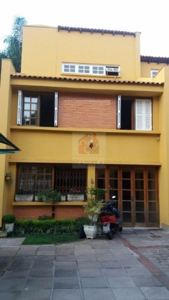 Imagem Casa com 3 Quartos à Venda, 116 m² em Medianeira - Porto Alegre Imagem Casa com 3 Quartos à Venda, 116 m² em Medianeira - Porto Alegre