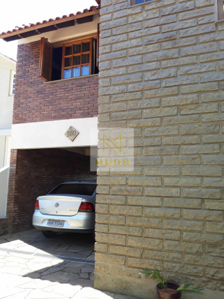 Imagem Casa com 3 Quartos à Venda, 268 m² em Espírito Santo - Porto Alegre Imagem Casa com 3 Quartos à Venda, 268 m² em Espírito Santo - Porto Alegre