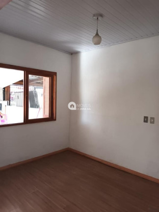 Imagem Casa com 2 Quartos à Venda, 56 m²