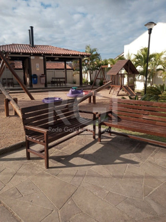 Imagem Casa de Condomínio com 2 Quartos à Venda, 56 m² em Restinga - Porto Alegre Imagem Casa de Condomínio com 2 Quartos à Venda, 56 m² em Restinga - Porto Alegre