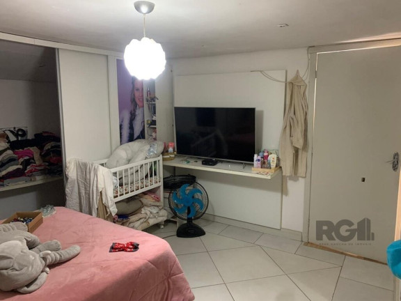 Imagem Casa com 4 Quartos à Venda,  em Santa Tereza - Porto Alegre