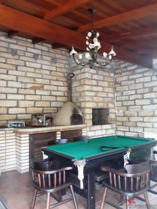 Imagem Casa com 4 Quartos à Venda, 317 m² em Centenário - Torres