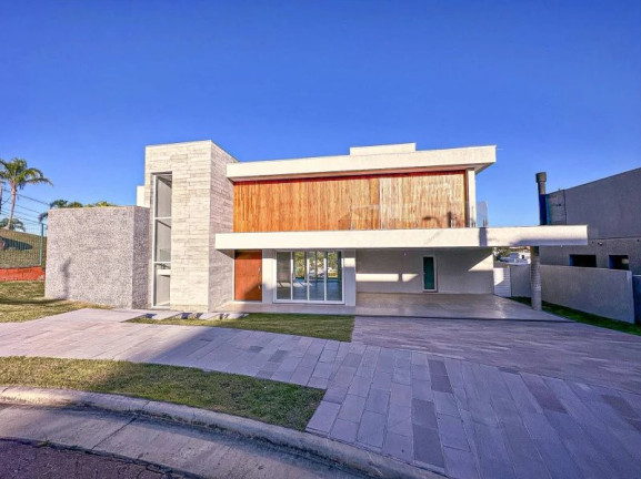 Imagem Casa com 4 Quartos à Venda, em Vila Nova - Porto Alegre Imagem Casa com 4 Quartos à Venda, em Vila Nova - Porto Alegre