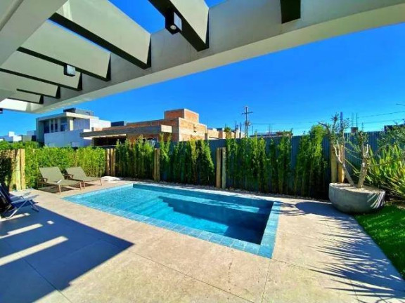 Imagem Casa com 4 Quartos à Venda, 250 m² em Xangri-lá