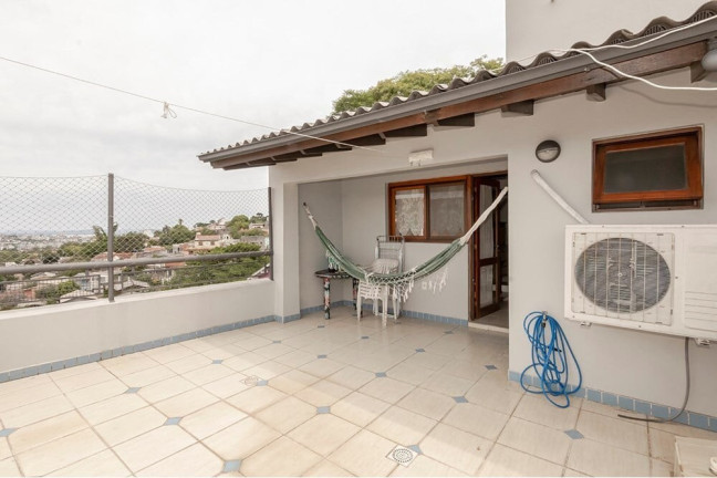 Imagem Casa com 3 Quartos à Venda, 160 m² em Nonoai - Porto Alegre Imagem Casa com 3 Quartos à Venda, 160 m² em Nonoai - Porto Alegre