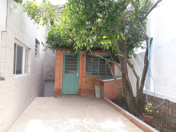 Imagem Casa com 4 Quartos à Venda,  em Menino Deus - Porto Alegre