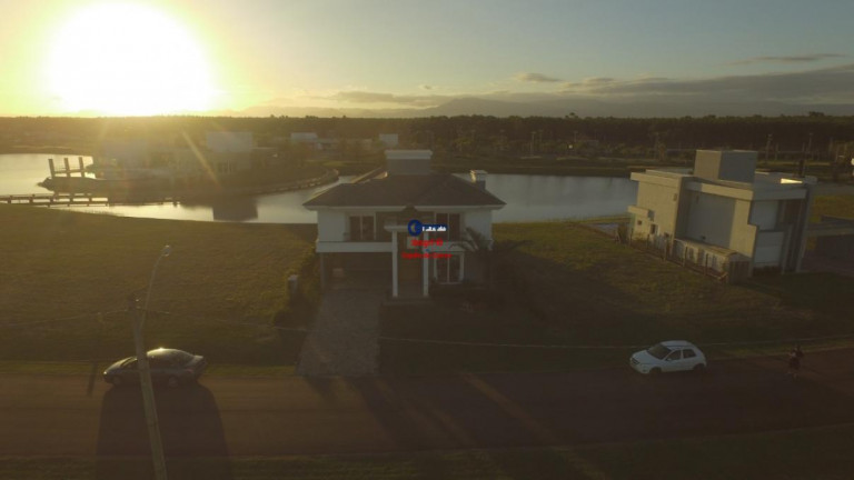 Imagem Casa de Condomínio com 4 Quartos à Venda, 300 m² em Capão Novo - Capão Da Canoa
