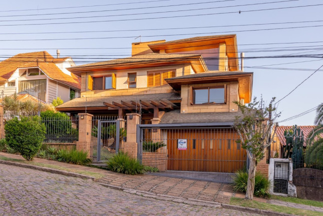 Imagem Casa com 5 Quartos à Venda, 498 m² em Ipanema - Porto Alegre Imagem Casa com 5 Quartos à Venda, 498 m² em Ipanema - Porto Alegre