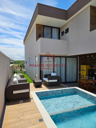 Imagem Casa de Condomínio com 4 Quartos à Venda, 252 m² em Guriri - Cabo Frio