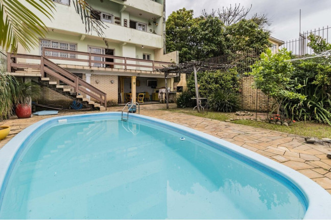 Imagem Casa com 3 Quartos à Venda, 464 m² em Santo Antônio - Porto Alegre Imagem Casa com 3 Quartos à Venda, 464 m² em Santo Antônio - Porto Alegre