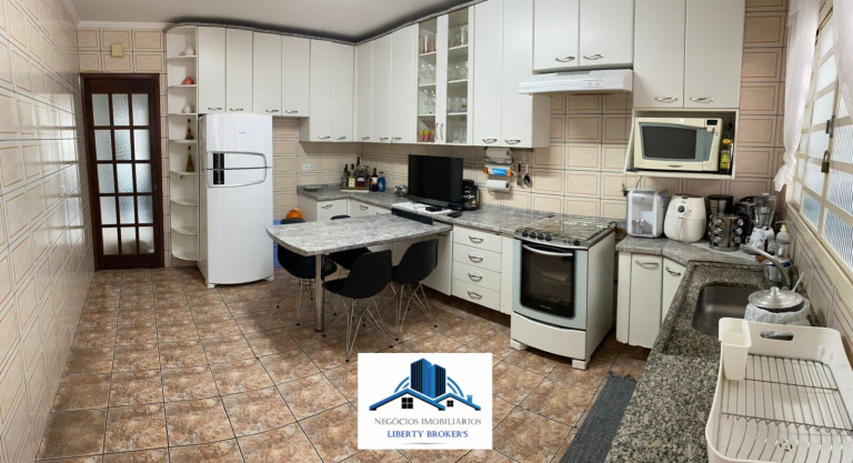 Imagem Casa com 3 Quartos à Venda, 143 m²