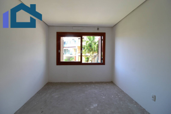 Imagem Sobrado com 3 Quartos à Venda, 224 m² em Vila Nova - Porto Alegre