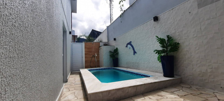 Imagem Casa de Condomínio com 2 Quartos à Venda, 110 m² em Massaguaçu - Caraguatatuba