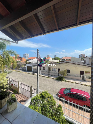 Imagem Casa com 4 Quartos à Venda, 240 m² em Centro - Torres Imagem Casa com 4 Quartos à Venda, 240 m² em Centro - Torres