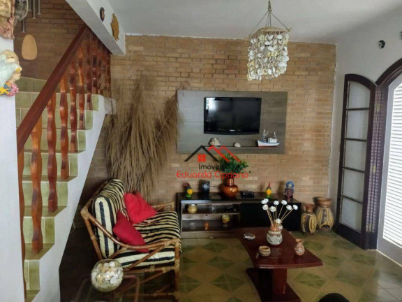 Imagem Sobrado com 4 Quartos à Venda, 218 m² em Massaguaçu - Caraguatatuba