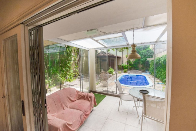 Imagem Casa com 4 Quartos à Venda, 272 m² em Rio Branco - Porto Alegre Imagem Casa com 4 Quartos à Venda, 272 m² em Rio Branco - Porto Alegre