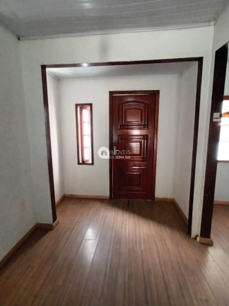 Imagem Casa com 2 Quartos à Venda, 56 m²