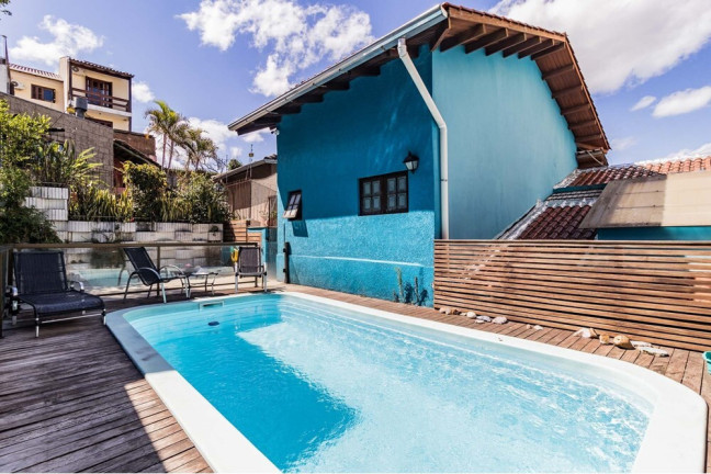 Imagem Casa com 4 Quartos à Venda, 216 m² em Partenon - Porto Alegre Imagem Casa com 4 Quartos à Venda, 216 m² em Partenon - Porto Alegre