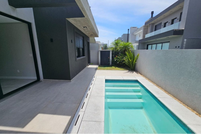 Imagem Casa de Condomínio com 4 Quartos à Venda, 150 m² em Centro - Xangri-lá Imagem Casa de Condomínio com 4 Quartos à Venda, 150 m² em Centro - Xangri-lá