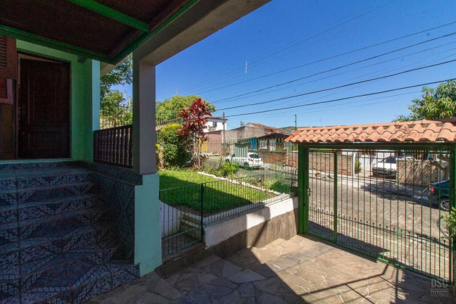 Imagem Casa com 3 Quartos à Venda, 216 m² em Vila Nova - Porto Alegre Imagem Casa com 3 Quartos à Venda, 216 m² em Vila Nova - Porto Alegre