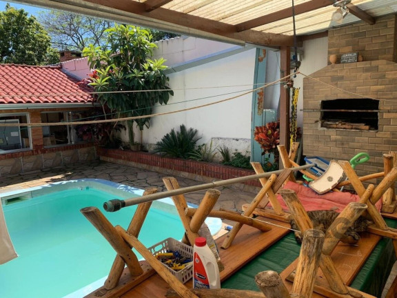Imagem Casa com 4 Quartos à Venda,  em Santa Tereza - Porto Alegre
