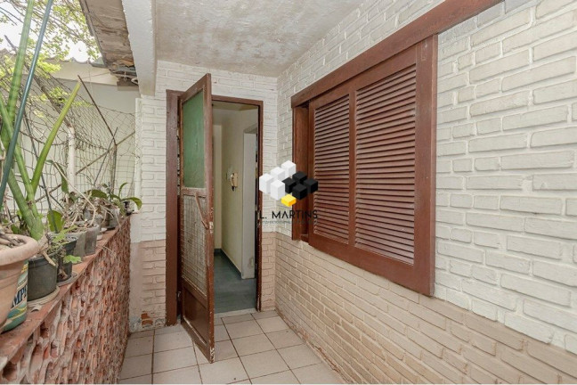 Imagem Casa com 5 Quartos à Venda, 164 m² em Cristal - Porto Alegre Imagem Casa com 5 Quartos à Venda, 164 m² em Cristal - Porto Alegre