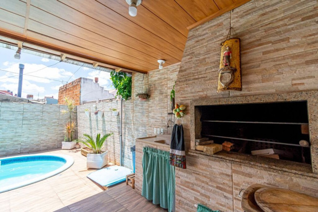 Imagem Casa com 4 Quartos à Venda, 165 m² em Igara - Canoas Imagem Casa com 4 Quartos à Venda, 165 m² em Igara - Canoas
