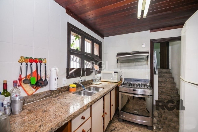 Imagem Casa com 3 Quartos à Venda, 253 m² em Rio Branco - Porto Alegre Imagem Casa com 3 Quartos à Venda, 253 m² em Rio Branco - Porto Alegre