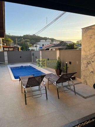 Imagem Casa com 4 Quartos à Venda, 180 m² em Centro - Porto Belo Imagem Casa com 4 Quartos à Venda, 180 m² em Centro - Porto Belo
