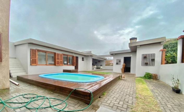 Imagem Casa com 4 Quartos à Venda, 200 m² em Centro - Xangri-lá Imagem Casa com 4 Quartos à Venda, 200 m² em Centro - Xangri-lá