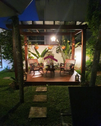Imagem Casa com 4 Quartos à Venda, 360 m² em Vila Santa Rosa - Guarujá