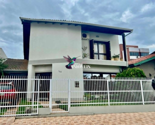 Imagem Casa com 4 Quartos à Venda, 240 m² em Centro - Torres Imagem Casa com 4 Quartos à Venda, 240 m² em Centro - Torres