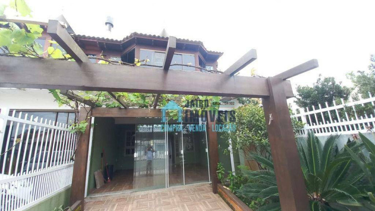 Imagem Sobrado com 3 Quartos à Venda, 180 m² em Centro - Tramandaí